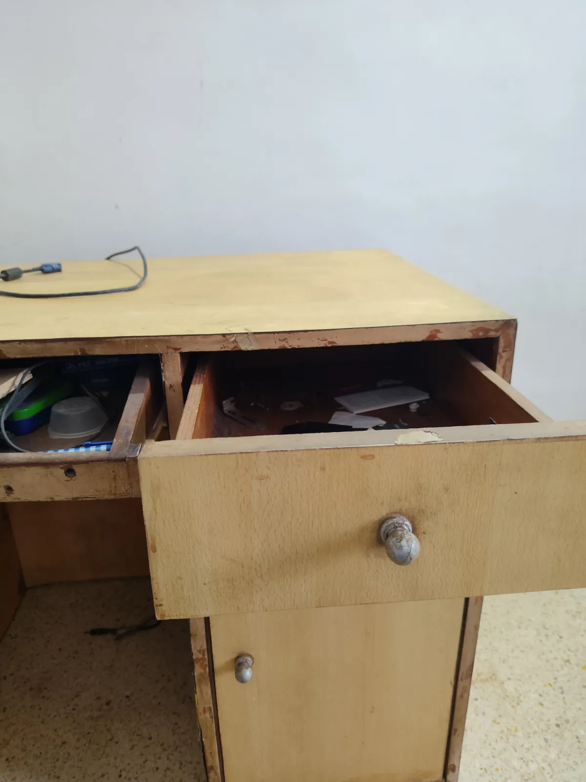 Plywood table with 2 cabinets and 1 drawer and a pc keyboard - Image 1
